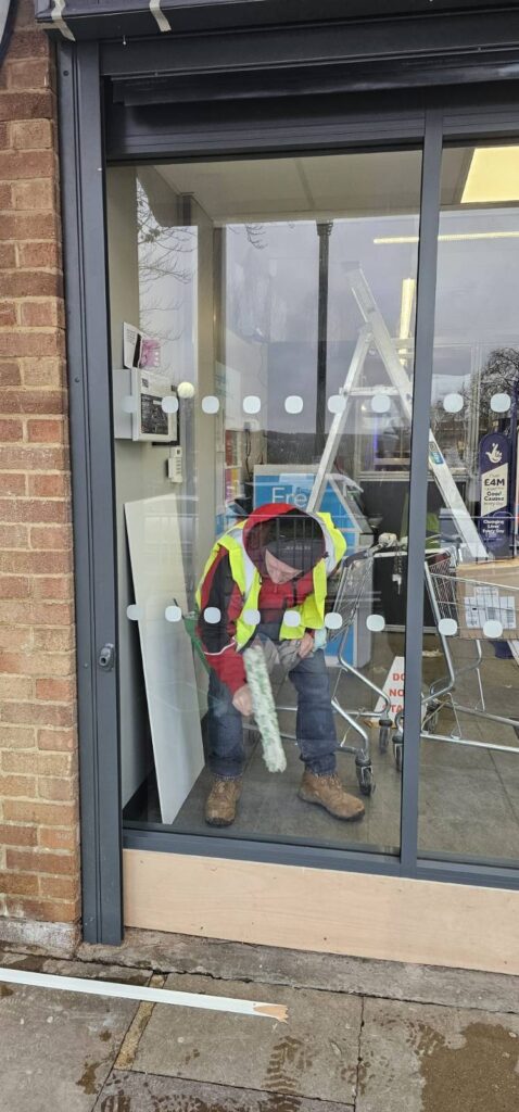 Front sliding door window cleaned at the co op welwyn garden city