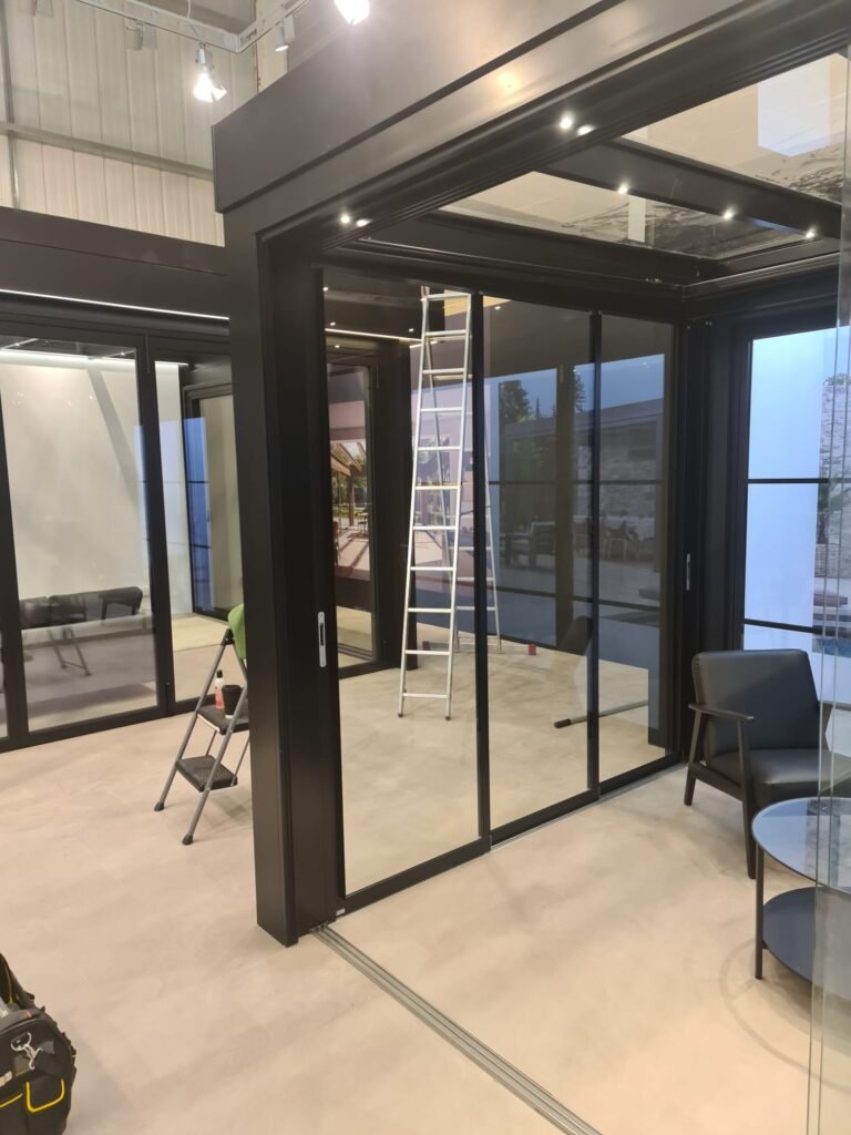 Solarlux glass extension with sliding doors, windows cleaned by Premium Outdoor Cleaning in Welwyn Garden City