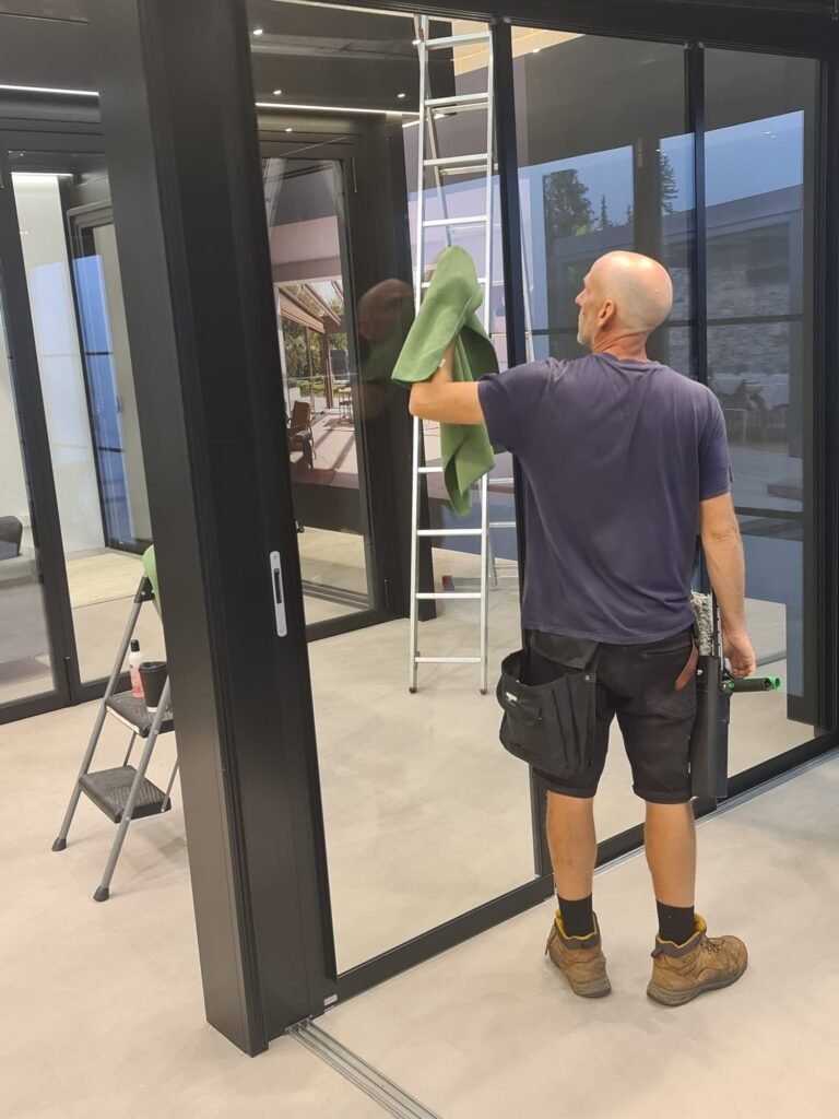 Hand cleaned glass extension doors at the Solarlux showroom, Welwyn Garden City